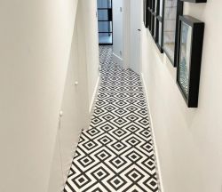 Black and white checked vinyl floor